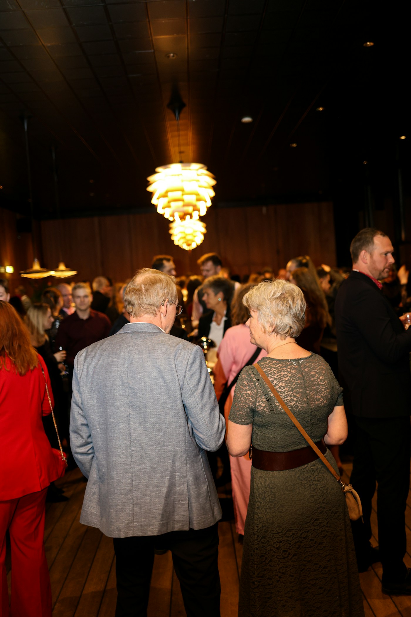 Guests mingling at an elegant corporate event